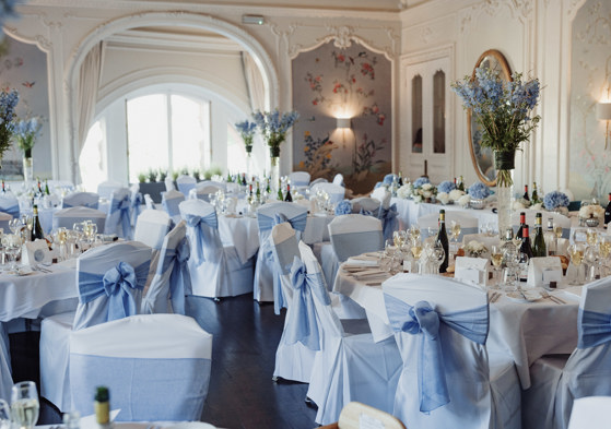 Wedding breakfast at Dean Banks at The Pompadour with blue and white wedding decor